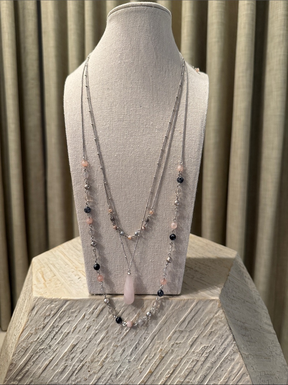 Pink gray, and black three strand necklace